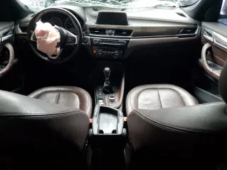 2017 BMW X1 xDrive28i z VIN WBXHT3Z39H4A57395, wystawiony jako Copart lot #56357845 z przebiegiem Nie podano mil oraz Szkody całkowita. Historia ofert i sprzedaży dostępna na DreamBid. Obrazek 8.