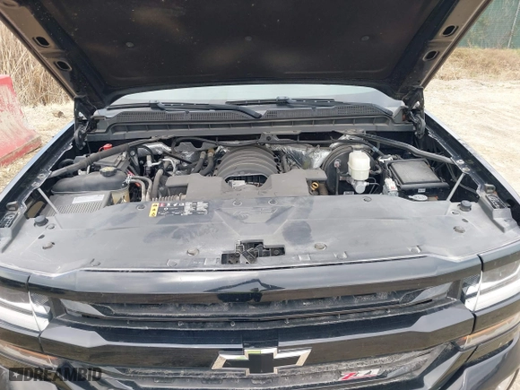 2018 Chevrolet Silverado 1500 LT with VIN 1GCVKREC7JZ165550, listed as a IAAI auction lot 41854559 with 77,647 mi miles. Bid and sale history available at carsss.com. Image 10.
