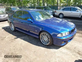 2002 BMW M5 z VIN WBSDE93452BZ99916, wystawiony jako IAAI lot #42346645 z przebiegiem 90 876 mil mil oraz . Historia ofert i sprzedaży dostępna na DreamBid. Obrazek 1.