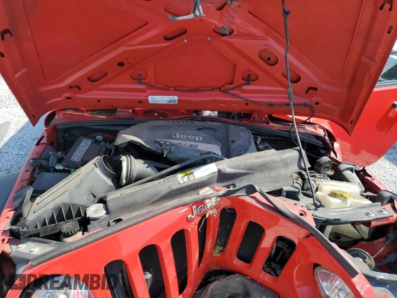 2015 Jeep Wrangler Unlimited Willys Wheeler with VIN 1C4BJWDG3FL726460, listed as a Copart auction lot 55827355 with 96,482 mi miles and Salvage Title. Bid and sale history available at DreamBid. Image 12.