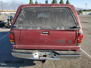 1997 Mazda B-Series 2WD Truck LE with VIN 4F4CR16X7VTM32921, listed as a Copart auction lot 89019835 with 156,928 mi miles and Clean Title. Bid and sale history available at carsss.com. Image 6.