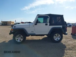2005 Jeep Wrangler Sport with VIN 1J4FA49SX5P336380, listed as a IAAI auction lot 41752554 with 139,004 mi miles. Bid and sale history available at carsss.com. Image 14.