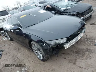 2016 Audi A7 3.0 Premium Plus with VIN WAUWGAFC0GN006470, listed as a IAAI auction lot 41638615 with 104,040 mi miles. Bid and sale history available at carsss.com. Image 1.