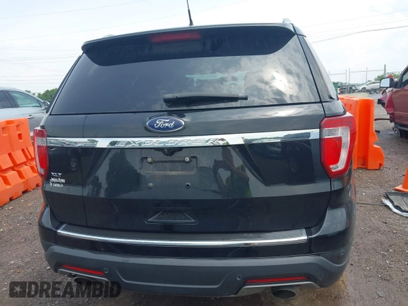 2018 Ford Explorer XLT z VIN 1FM5K7D83JGC39166, wystawiony jako IAAI lot #42425333 z przebiegiem 122 029 mil mil oraz . Historia ofert i sprzedaży dostępna na DreamBid. Obrazek 16.