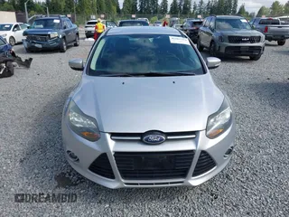 2014 Ford Focus Titanium with VIN 1FADP3N20EL160982, listed as a IAAI auction lot 42565322 with 112,551 mi miles and . Bid and sale history available at DreamBid. Image 12.