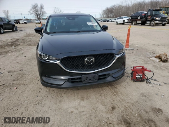 2018 Mazda CX-5 Touring with VIN JM3KFBCM2J0427786, listed as a Copart auction lot 45539345 with 62,989 mi miles and Salvage Title. Bid and sale history available at carsss.com. Image 5.