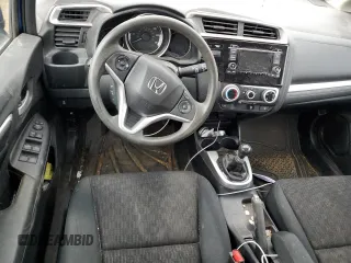 2017 Honda Fit LX with VIN 3HGGK5G50HM702451, listed as a Copart auction lot 80144223 with 82,716 mi miles and Salvage Title. Bid and sale history available at DreamBid. Image 8.
