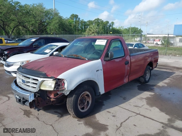 1999 Ford F-150 Work Series with VIN 1FTZF1727XKA70063, listed as a IAAI auction lot 41948032 with 134,642 mi miles. Bid and sale history available at carsss.com. Image 2.