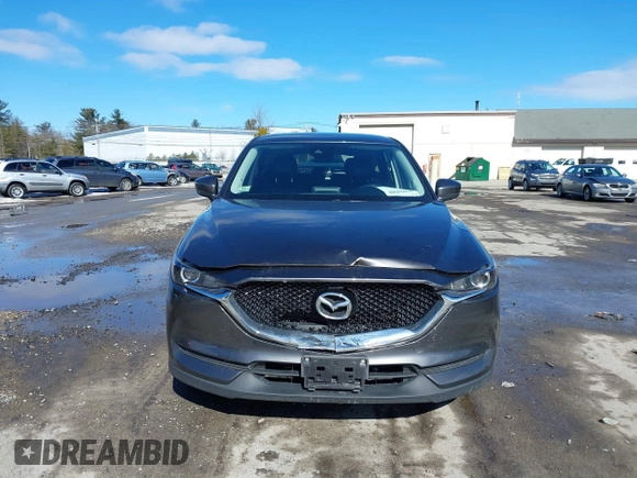 2017 Mazda CX-5 Touring with VIN JM3KFBCL3H0214881, listed as a IAAI auction lot 41694560 with 64,609 mi miles. Bid and sale history available at carsss.com. Image 12.