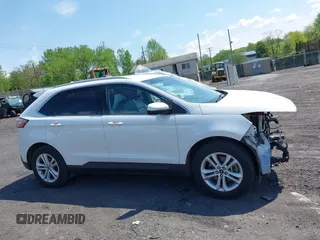 2020 Ford Edge SEL z VIN 2FMPK4J95LBA31157, wystawiony jako IAAI lot #42225863 z przebiegiem 96 082 mil mil oraz . Historia ofert i sprzedaży dostępna na DreamBid. Obrazek 13.