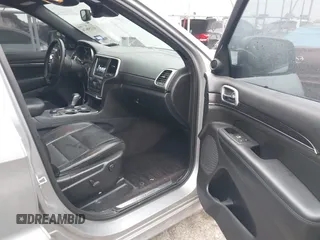 2018 Jeep Grand Cherokee High Altitude with VIN 1C4RJFCG4JC360338, listed as a IAAI auction lot 41250674 with 83,924 mi miles. Bid and sale history available at carsss.com. Image 5.