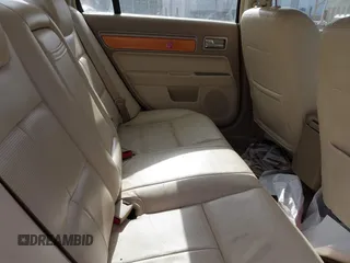 2008 Lincoln MKZ with VIN 3LNHM28T98R625456, listed as a IAAI auction lot 42075166 with 143,723 mi miles. Bid and sale history available at carsss.com. Image 8.
