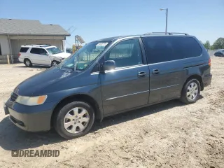 2003 Honda Odyssey EX-L with VIN 5FNRL18923B034731, listed as a Copart auction lot 53406775 with 204,801 mi miles and Clean Title. Bid and sale history available at DreamBid. Image 1.