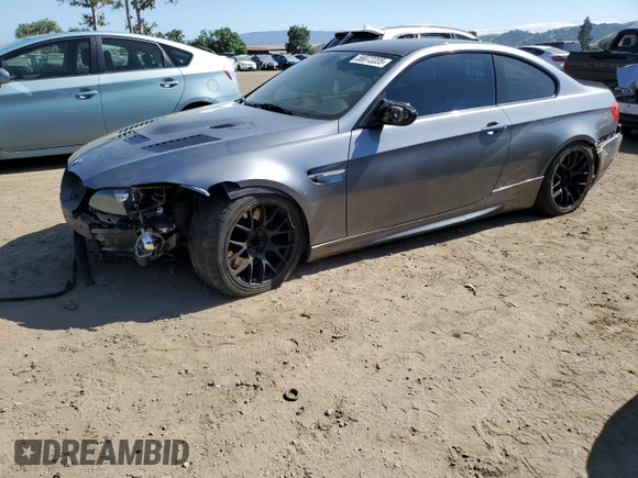 2012 BMW M3 with VIN WBSKG9C53CE798624, listed as a Copart auction lot 56072225 with 126,371 mi miles and Salvage title. Bid and sale history available at DreamBid. Image 1.