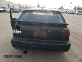 1996 Volkswagen GTI z VIN 3VWHD81H3TM048956, wystawiony jako Copart lot #84068734 z przebiegiem Nie podano mil oraz Szkoda całkowita • Salvage title. Historia ofert i sprzedaży dostępna na DreamBid. Obrazek 6.