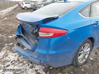 2019 Ford Fusion Hybrid SE with VIN 3FA6P0LUXKR131563, listed as a IAAI auction lot 41448736 with 165,440 mi miles. Bid and sale history available at carsss.com. Image 17.