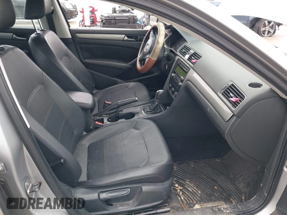 2014 Volkswagen Passat Wolfsburg Edition with VIN 1VWAT7A32EC028320, listed as a IAAI auction lot 41456457 with 173,581 mi miles and . Bid and sale history available at DreamBid. Image 5.