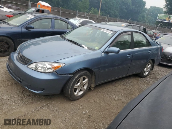 2002 Toyota Camry LE z VIN 4T1BE32K82U635971, wystawiony jako Copart lot #60784855 z przebiegiem Nie podano mil oraz Szkoda całkowita • Salvage title. Historia ofert i sprzedaży dostępna na DreamBid. Obrazek 1.