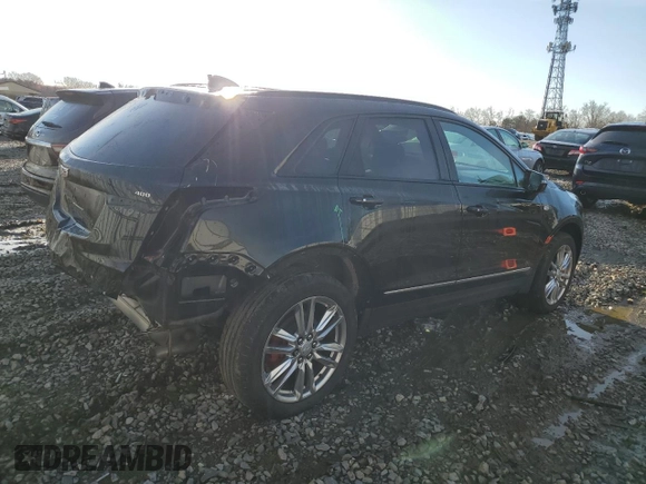 2023 Cadillac XT5 AWD Sport with VIN 1GYKNGRS6PZ131182, listed as a Copart auction lot 49907105 with 38,734 mi miles and Salvage title. Bid and sale history available at DreamBid. Image 3.