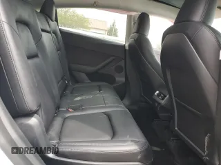2023 Tesla Model Y Long Range z VIN 7SAYGAEE9PF686434, wystawiony jako Copart lot #54593475 z przebiegiem Nie podano mil oraz Szkoda całkowita • Salvage title. Historia ofert i sprzedaży dostępna na DreamBid. Obrazek 11.