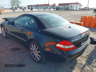 2007 Mercedes-Benz SL 550 с VIN WDBSK71F27F132696, выставлен на аукционе IAAI как лот 42053879 с пробегом 115 093 миль миль и . История ставок и продаж доступна на DreamBid. Изображение 3.