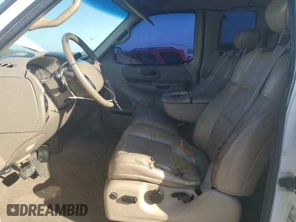 2001 Ford F-150 XL z VIN 2FTRX08LX1CB01820, wystawiony jako Copart lot #48785635 z przebiegiem 334 615 mil mil oraz Szkoda całkowita • Salvage title. Historia ofert i sprzedaży dostępna na DreamBid. Obrazek 7.