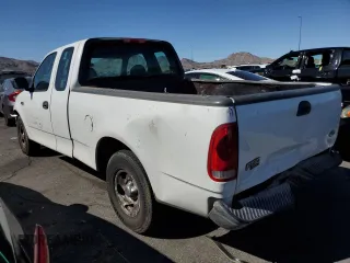 2004 Ford F-150 XL with VIN 2FTRX17204CA03494, listed as a Copart auction lot 59884165 with 226,973 mi miles and Salvage title. Bid and sale history available at DreamBid. Image 2.