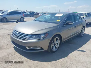 2013 Volkswagen CC Sport with VIN WVWBN7AN2DE555375, listed as a IAAI auction lot 42048643 with 125,484 mi miles and . Bid and sale history available at DreamBid. Image 2.