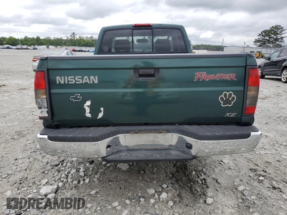 2000 Nissan Frontier XE with VIN 1N6DD26SXYC400648, listed as a Copart auction lot 58756855 with 148,051 mi miles and Salvage title. Bid and sale history available at DreamBid. Image 6.