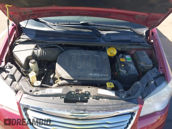 2014 Chrysler Town & Country Touring with VIN 2C4RC1BG9ER326259, listed as a IAAI auction lot 42160484 with 151,896 mi miles and . Bid and sale history available at DreamBid. Image 10.
