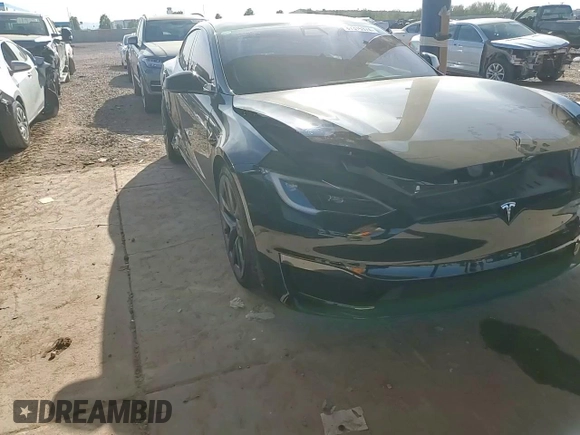 2022 Tesla Model S z VIN 5YJSA1E51NF474743, wystawiony jako Copart lot #87316374 z przebiegiem Nie podano mil oraz Szkoda całkowita • Salvage title. Historia ofert i sprzedaży dostępna na DreamBid. Obrazek 10.