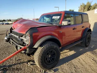 2024 Ford Bronco Wildtrak with VIN 1FMEE2BP5RLA54608, listed as a Copart auction lot 84276804 with 7,011 mi miles and Salvage Title. Bid and sale history available at carsss.com. Image 1.
