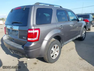2011 Ford Escape Limited with VIN 1FMCU0EG0BKA82063, listed as a IAAI auction lot 41993781 with 156,991 mi miles. Bid and sale history available at carsss.com. Image 4.