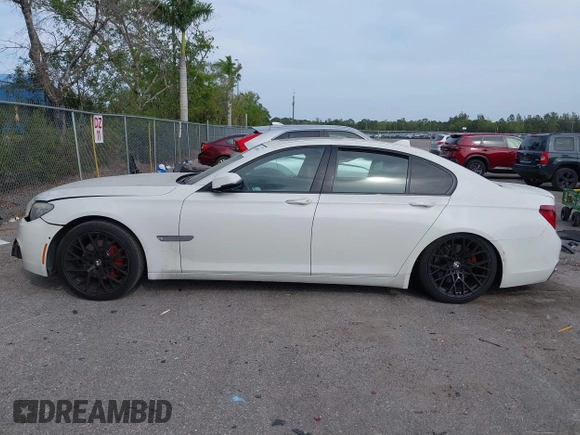 2013 BMW 7 Series 740i with VIN WBAYA6C52DD143862, listed as a IAAI auction lot 41859183 with 133,666 mi miles. Bid and sale history available at carsss.com. Image 15.