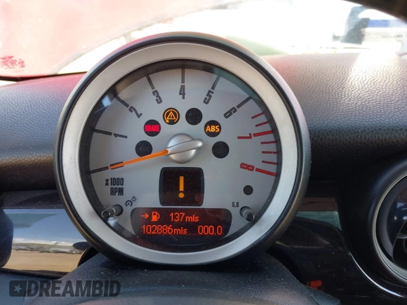 2010 MINI Hardtop S with VIN WMWMF7C51ATX43277, listed as a IAAI auction lot 42107871 with 102,886 mi miles and . Bid and sale history available at DreamBid. Image 7.