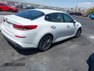 2019 Kia Optima LX with VIN 5XXGT4L30KG335926, listed as a IAAI auction lot 41986835 with 114,309 mi miles. Bid and sale history available at carsss.com. Image 4.