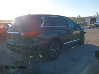 2019 Infiniti QX60 LUXE with VIN 5N1DL0MN0KC548592, listed as a IAAI auction lot 41305876 with 142,064 mi miles. Bid and sale history available at carsss.com. Image 4.