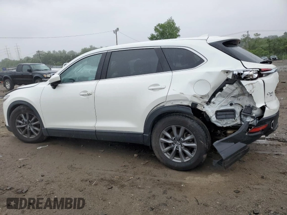 2021 Mazda CX-9 Touring with VIN JM3TCBCY1M0517709, listed as a Copart auction lot 57624945 with 64,081 mi miles and Salvage title. Bid and sale history available at DreamBid. Image 2.