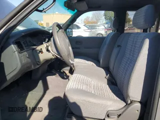 1995 Toyota T100 z VIN JT4VD22FXS0007824, wystawiony jako Copart lot #79159804 z przebiegiem 89 139 mil mil oraz Szkoda całkowita • Salvage title. Historia ofert i sprzedaży dostępna na DreamBid. Obrazek 7.