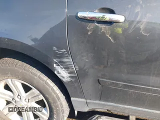 2013 Chevrolet Traverse LT with VIN 1GNKVGKD4DJ210384, listed as a IAAI auction lot 41881058 with 205,045 mi miles and . Bid and sale history available at DreamBid. Image 13.