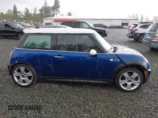 2003 MINI Hardtop S z VIN WMWRE33433TD60388, wystawiony jako IAAI lot #42313209 z przebiegiem 125 869 mil mil oraz . Historia ofert i sprzedaży dostępna na DreamBid. Obrazek 13.