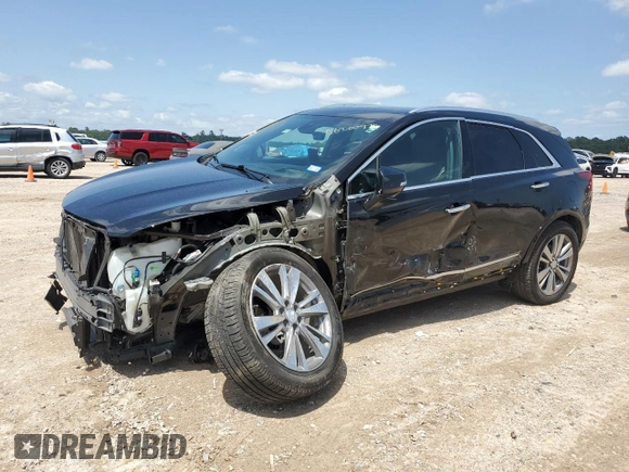 2022 Cadillac XT5 FWD Premium Luxury with VIN 1GYKNCRS0NZ178827, listed as a Copart auction lot 56200975 with 47,774 mi miles and Salvage title. Bid and sale history available at DreamBid. Image 1.