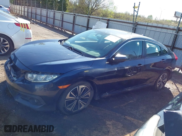 2016 Honda Civic Sedan EX-T with VIN 19XFC1F30GE025233, listed as a IAAI auction lot 41987604 with 129,311 mi miles. Bid and sale history available at carsss.com. Image 14.