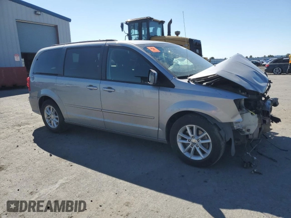 2014 Dodge Grand Caravan SXT with VIN 2C4RDGCG4ER478657, listed as a Copart auction lot 55691085 with 139,681 mi miles and Salvage Title. Bid and sale history available at DreamBid. Image 4.