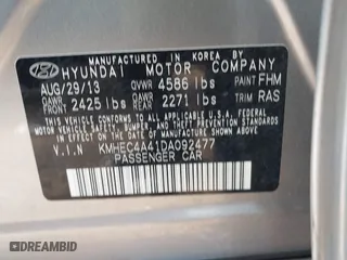 2013 Hyundai Sonata Hybrid with VIN KMHEC4A41DA092477, listed as a IAAI auction lot 41453656 with 124,804 mi miles. Bid and sale history available at carsss.com. Image 9.