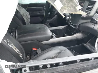 2021 Ram 1500 Rebel with VIN 1C6SRFLT0MN734774, listed as a IAAI auction lot 41075676 with 95,808 mi miles and . Bid and sale history available at DreamBid. Image 5.