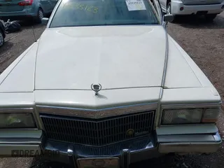 1991 Cadillac Brougham z VIN 1G6DW54E5MR723477, wystawiony jako IAAI lot #42535123 z przebiegiem 300 768 mil mil oraz . Historia ofert i sprzedaży dostępna na DreamBid. Obrazek 10.