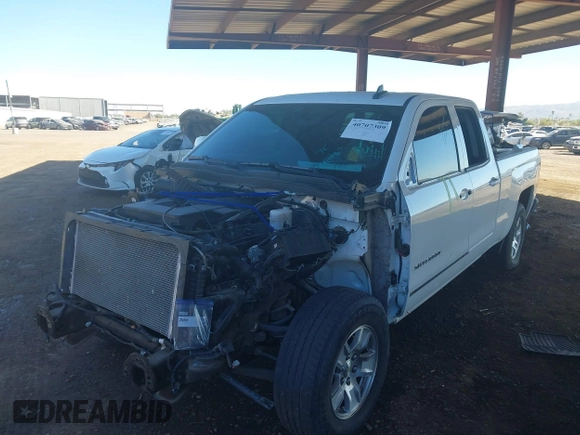2015 Chevrolet Silverado 1500 LT with VIN 1GCRCREC6FZ423241, listed as a IAAI auction lot 40707309 with 114,778 mi miles. Bid and sale history available at carsss.com. Image 2.
