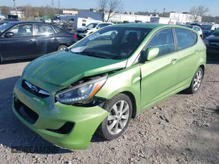 2014 Hyundai Accent SE z VIN KMHCU5AEXEU175389, wystawiony jako IAAI lot #42067176 z przebiegiem 124 741 mil mil oraz . Historia ofert i sprzedaży dostępna na DreamBid. Obrazek 17.