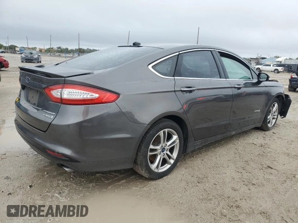 2016 Ford Fusion Titanium Hybrid with VIN 3FA6P0RU1GR204009, listed as a Copart auction lot 89110025 with 114,578 mi miles and Salvage Title. Bid and sale history available at carsss.com. Image 3.